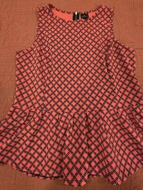Sleeveless Bright Coral Peplum Top with Black Diamond Print